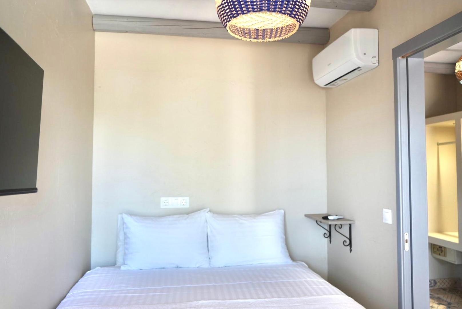 George Suites Stegna อาร์คานเยโลส ภายนอก รูปภาพ